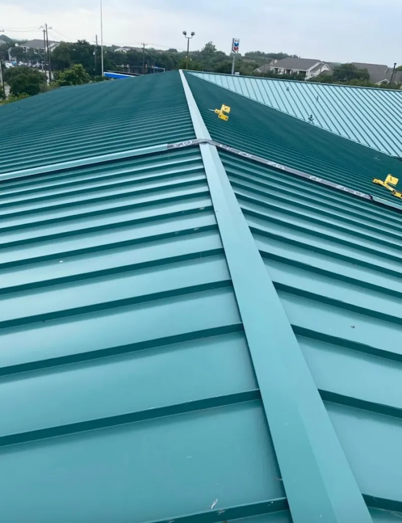 Green commercial metal roof ridge and valley for Metal Roof Repair in Port Allen